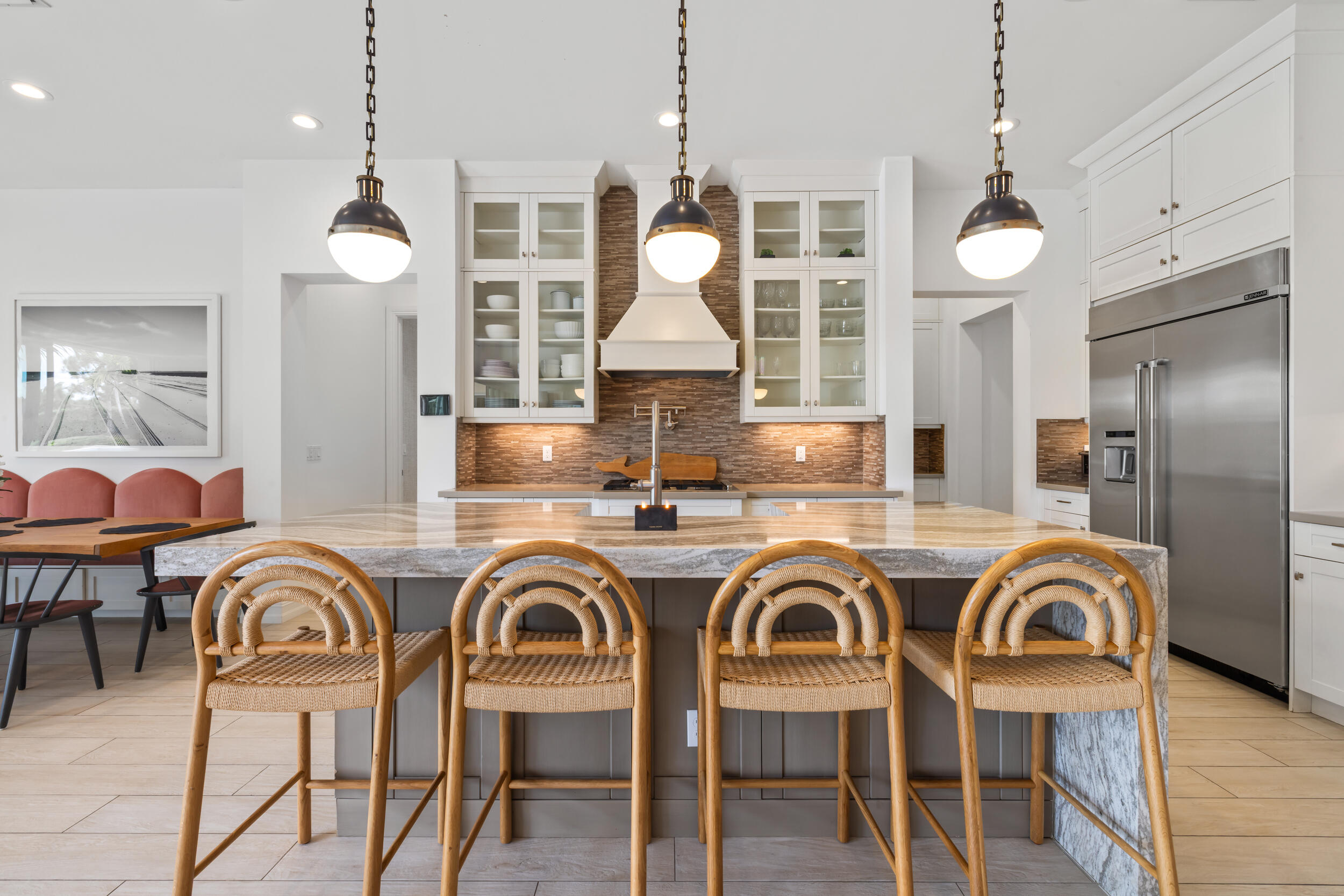 8001 Southeast Plantation Circle Jupiter, FL 33458 - Photo 12 of 50 a view of a dining room with furniture and chandelier