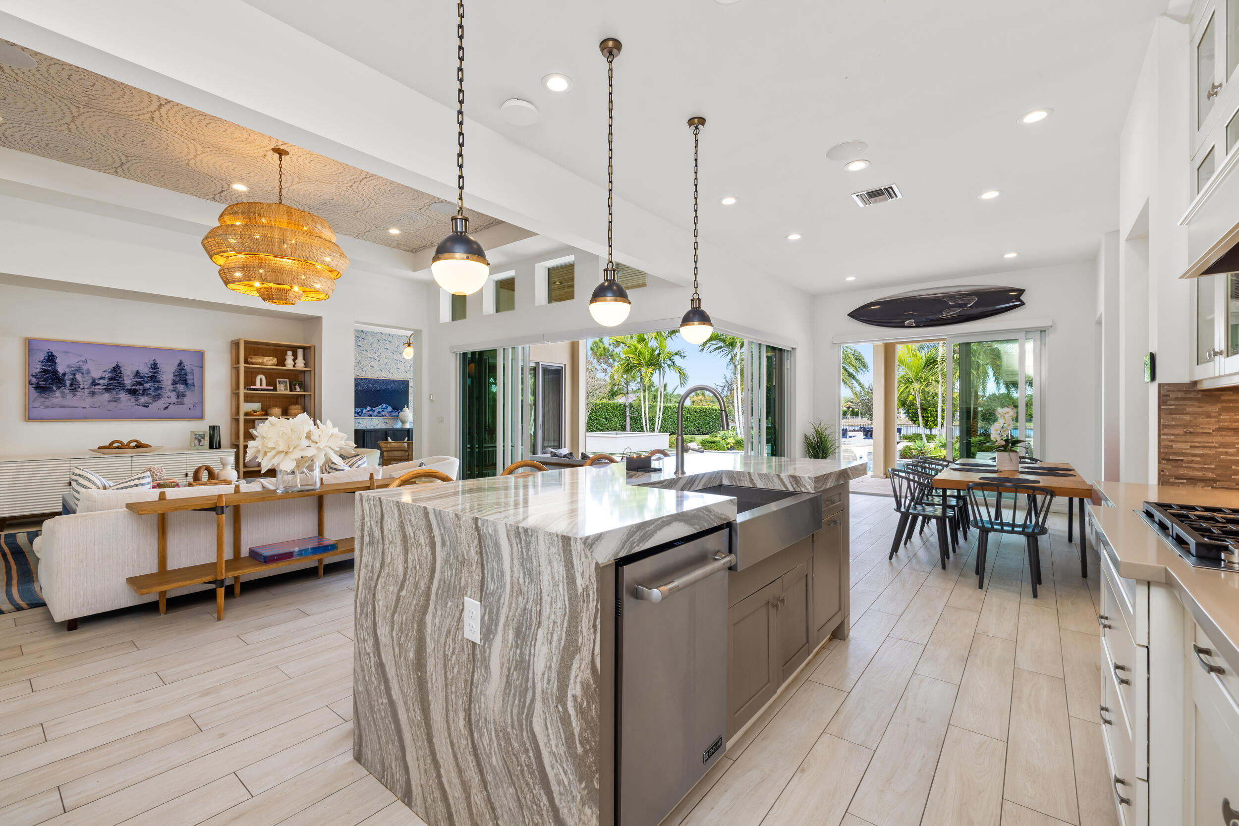8001 Southeast Plantation Circle Jupiter, FL 33458 - Photo 13 of 50 a large kitchen with a table and chairs in it