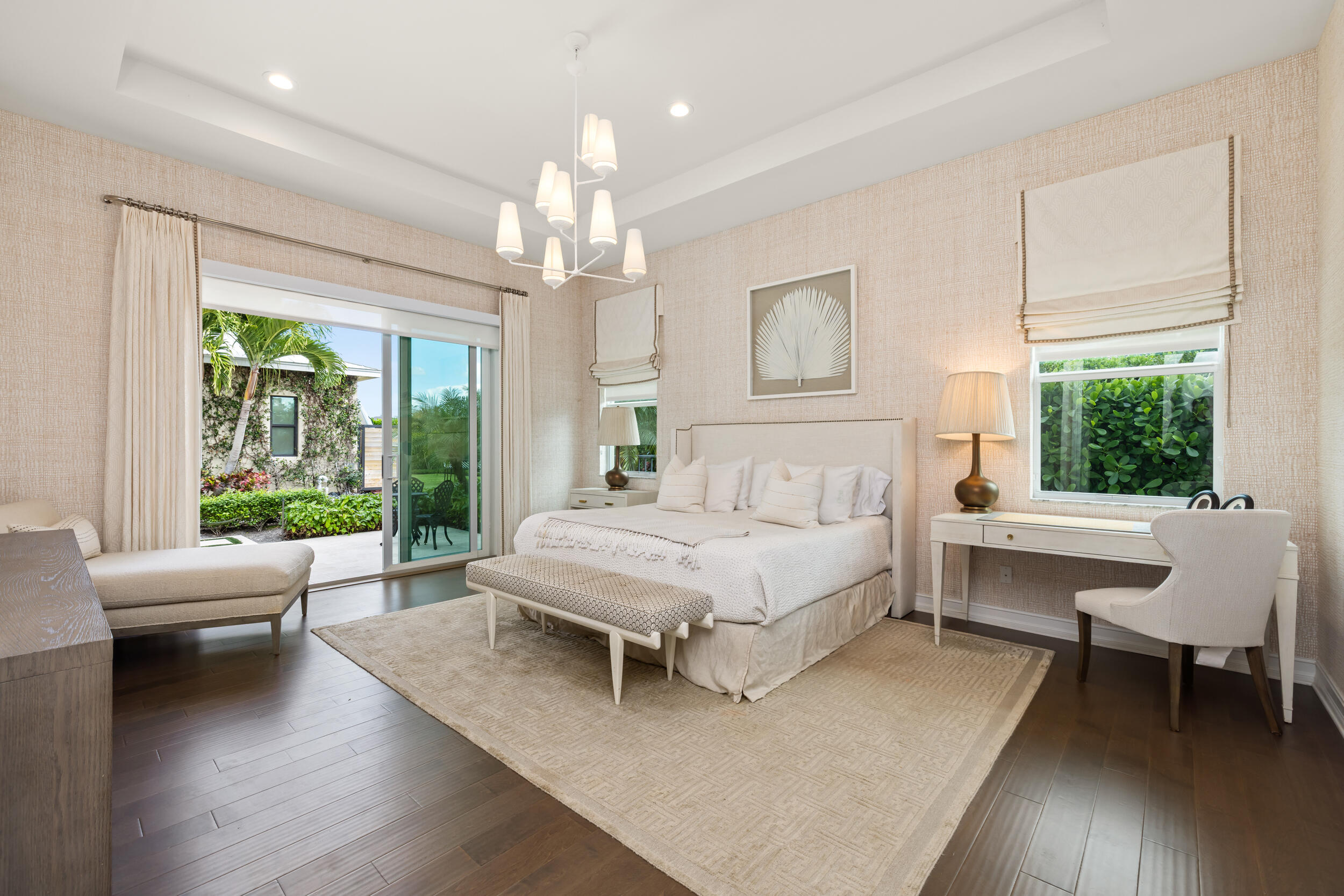 8001 Southeast Plantation Circle Jupiter, FL 33458 - Photo 19 of 50 a spacious bedroom with a bed and a large window