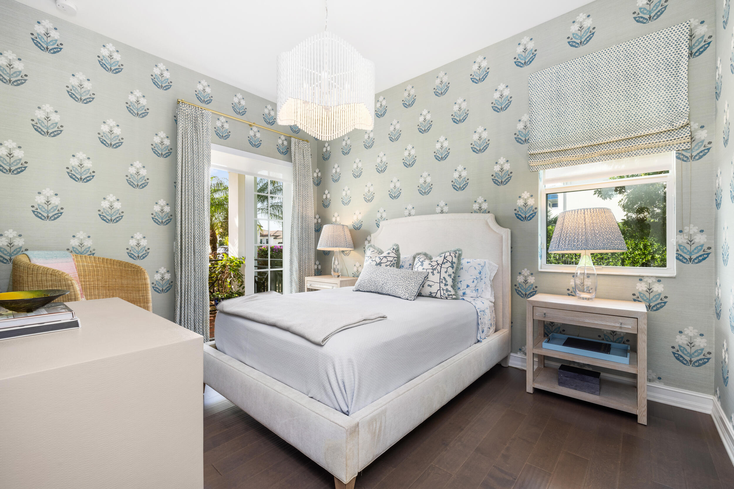 8001 Southeast Plantation Circle Jupiter, FL 33458 - Photo 21 of 50 a bedroom with a bed and a flat tv screen on the dresser