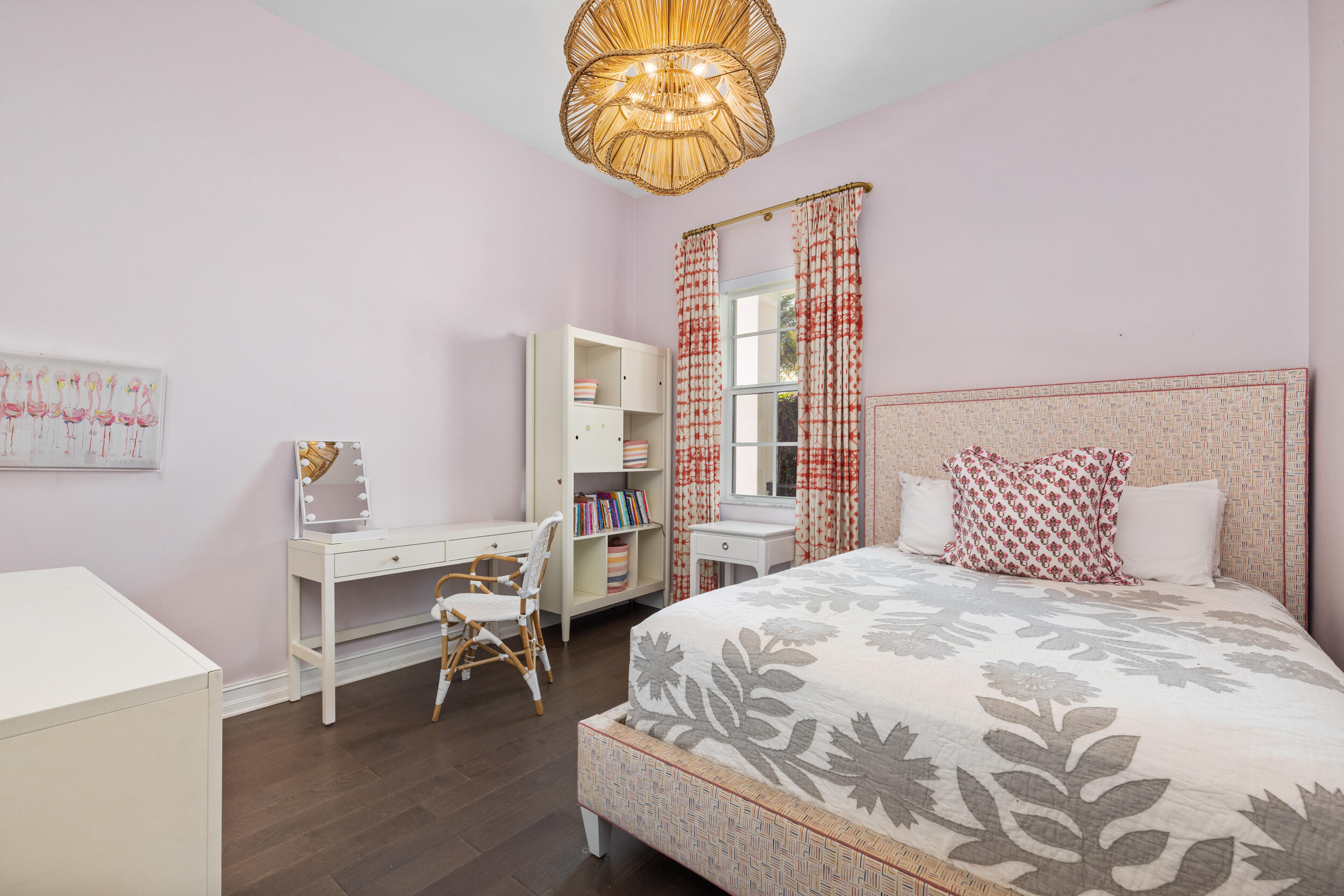 8001 Southeast Plantation Circle Jupiter, FL 33458 - Photo 23 of 50 a bedroom with a bed and a chandelier