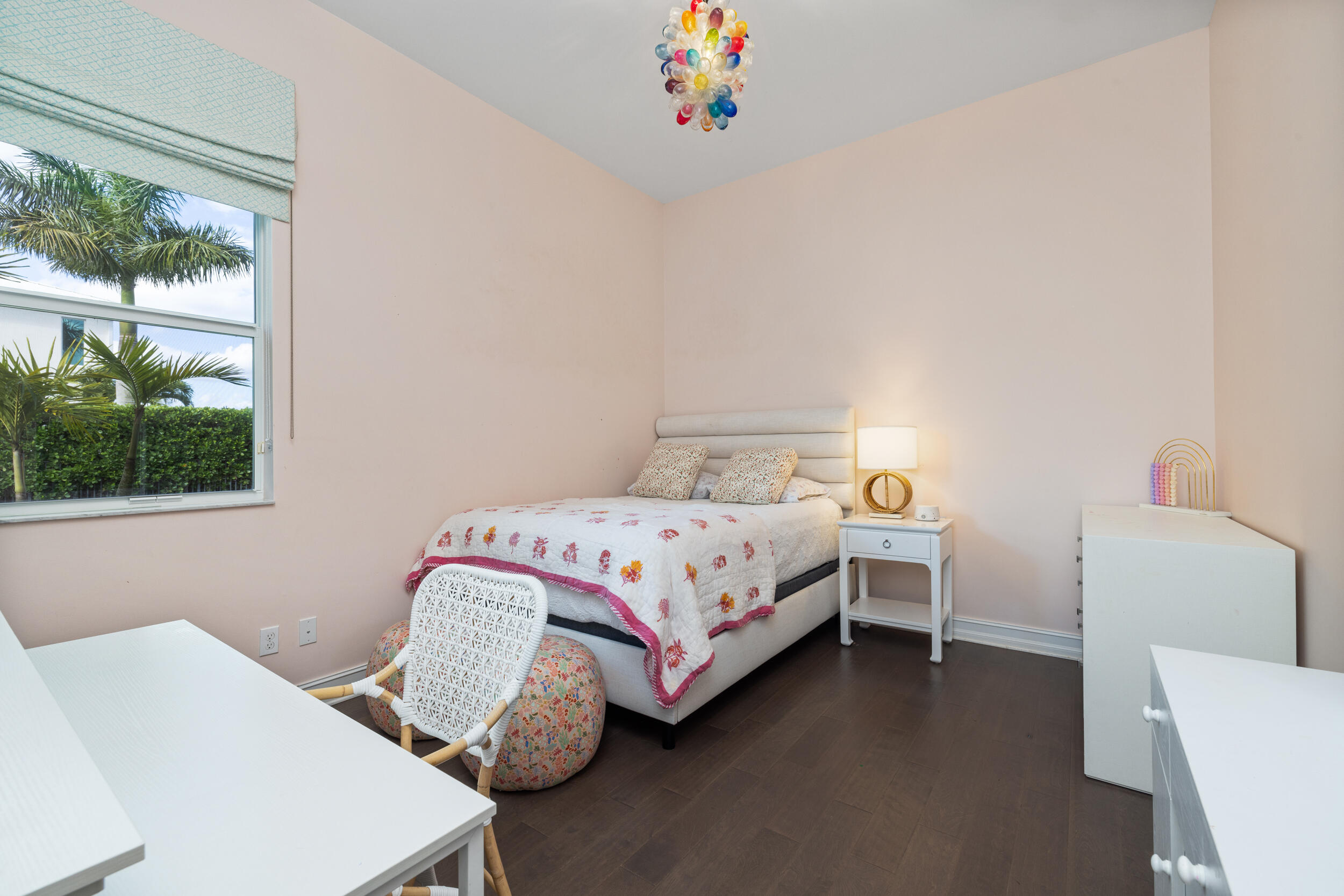 8001 Southeast Plantation Circle Jupiter, FL 33458 - Photo 25 of 50 a bedroom with a bed and a window