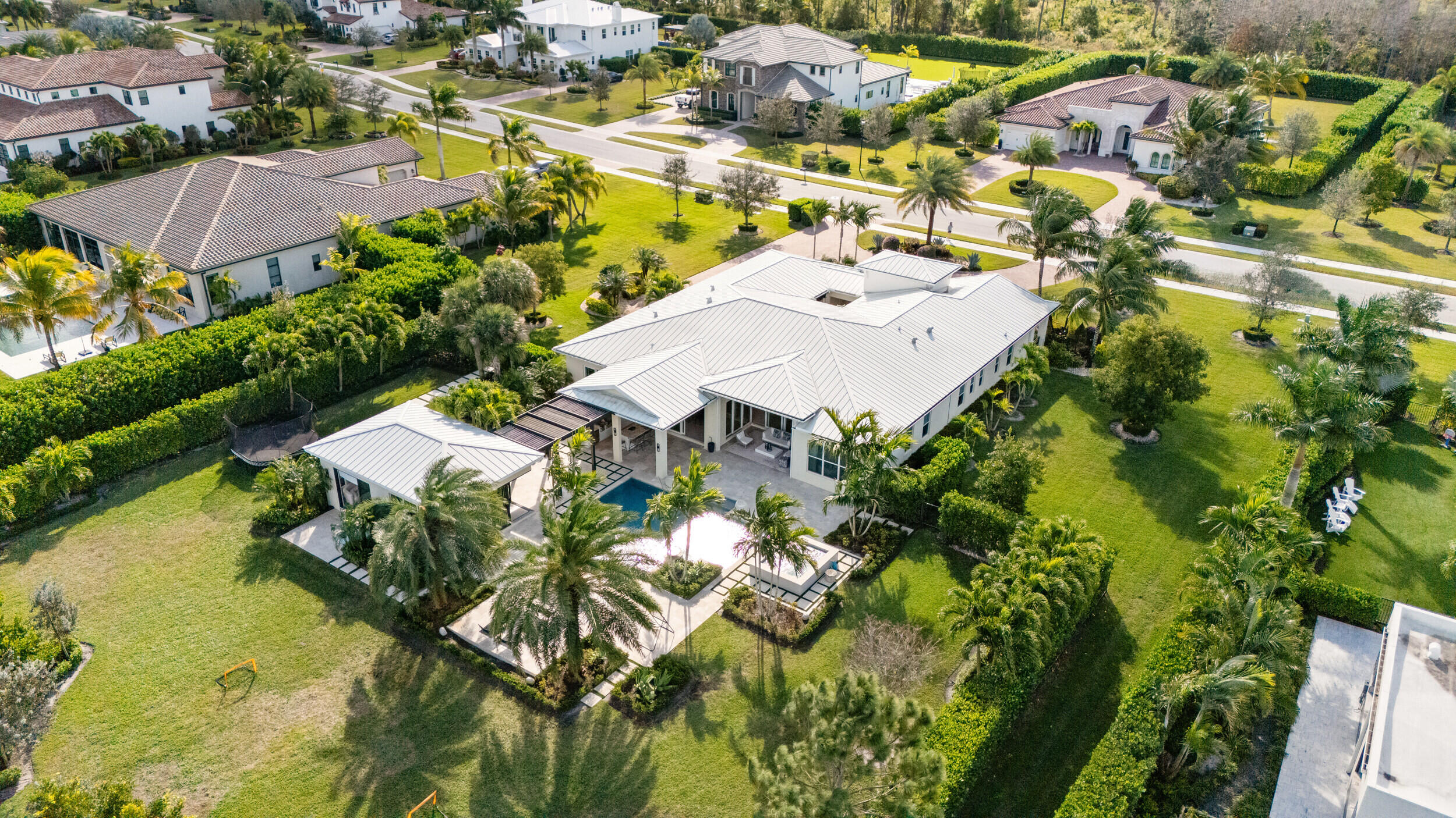 8001 Southeast Plantation Circle Jupiter, FL 33458 - Photo 40 of 50 an aerial view of residential houses with outdoor space