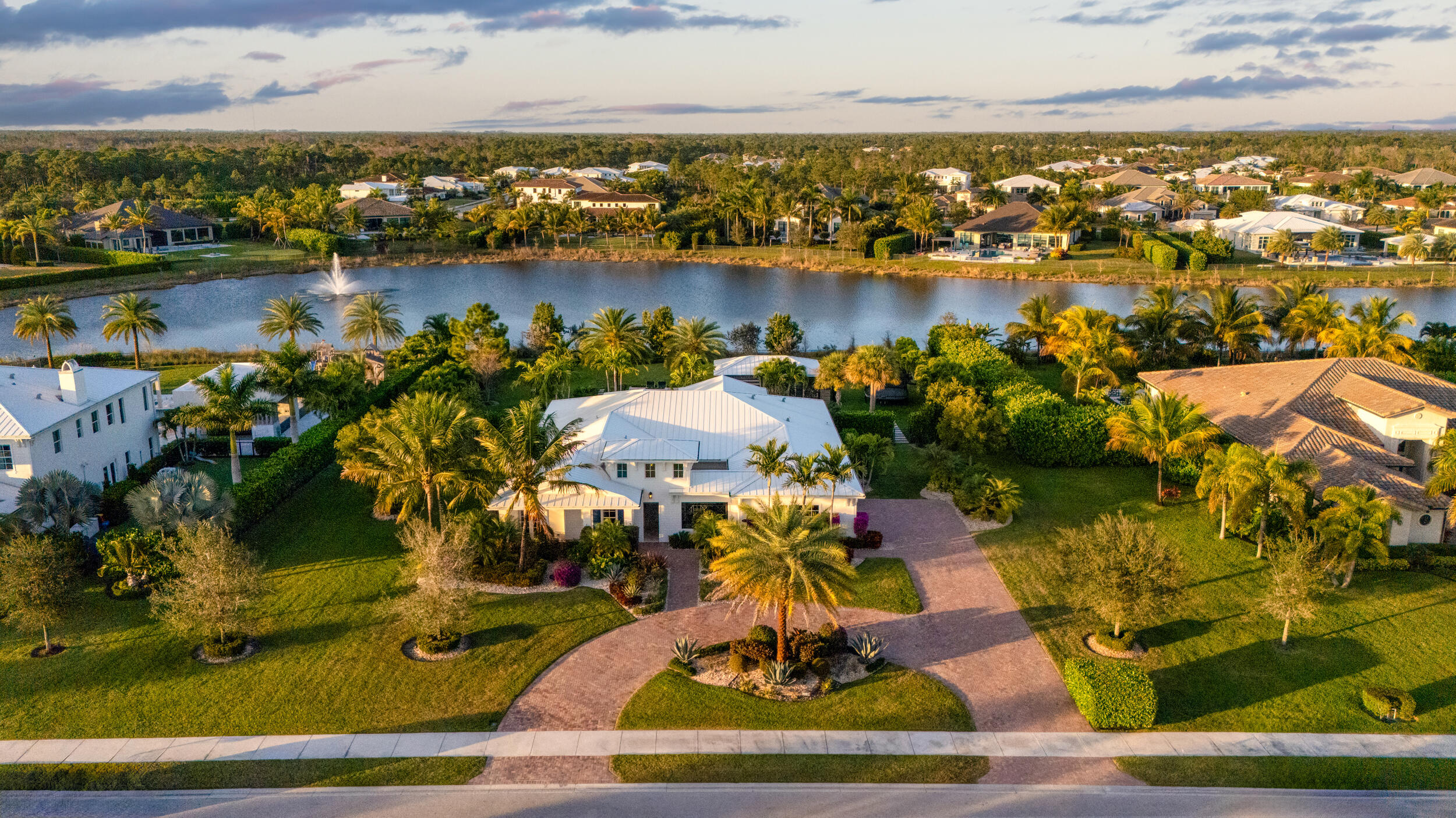 8001 Southeast Plantation Circle Jupiter, FL 33458 - Photo 42 of 50 an aerial view of residential houses with outdoor space and ocean view