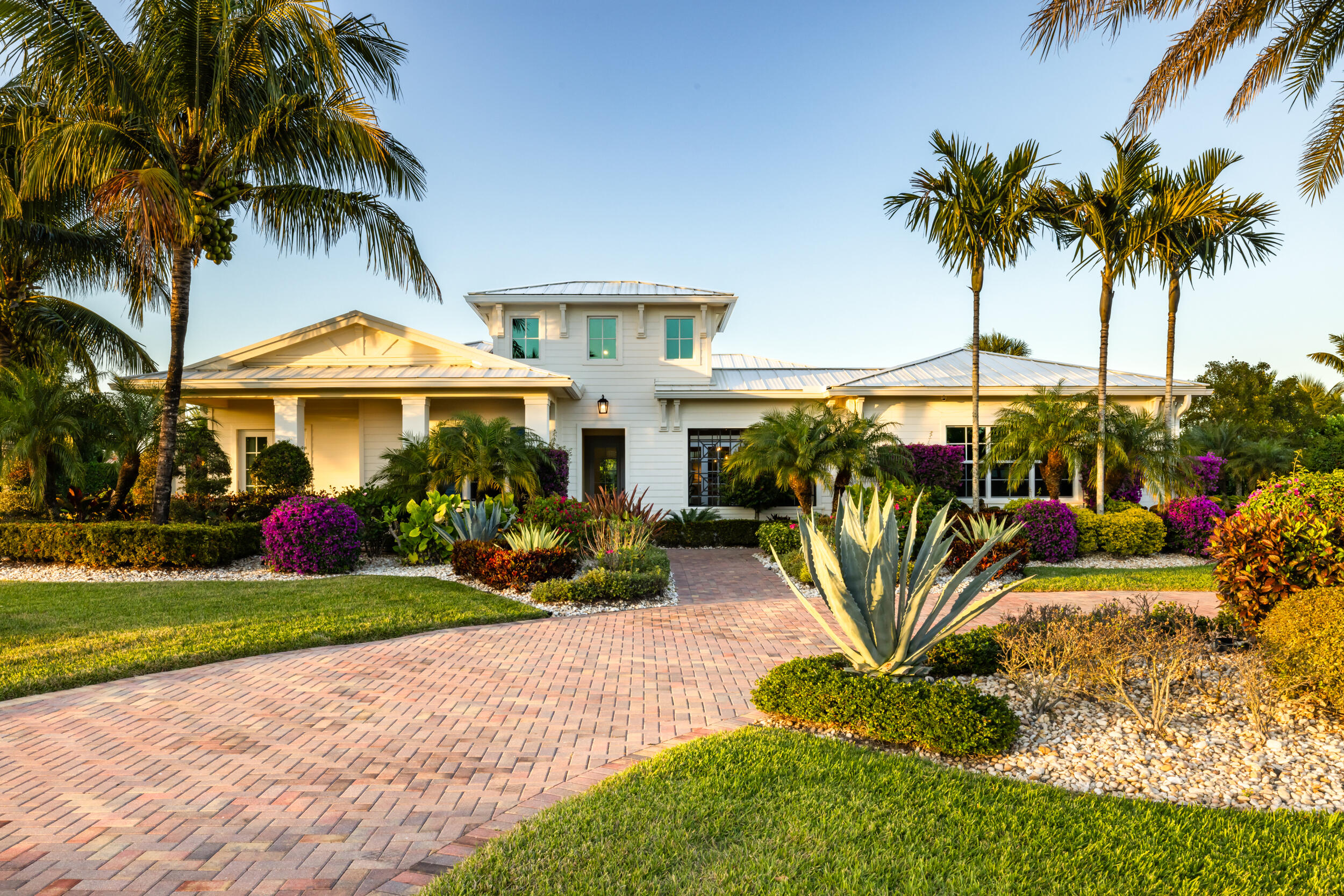 8001 Southeast Plantation Circle Jupiter, FL 33458 - Photo 43 of 50 a view of a table and chairs under an umbrella