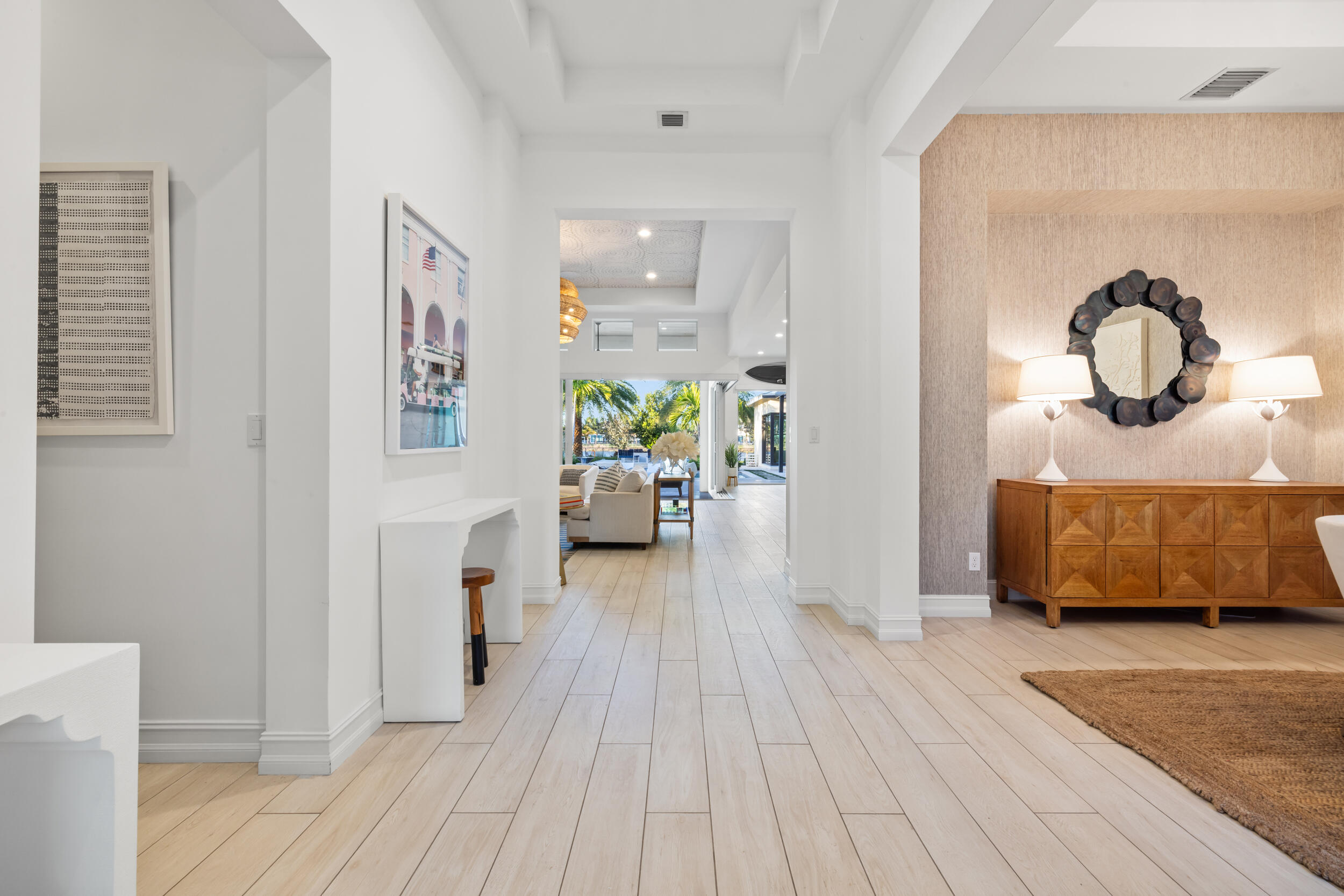 8001 Southeast Plantation Circle Jupiter, FL 33458 - Photo 5 of 50 a living room with furniture and a wooden floor