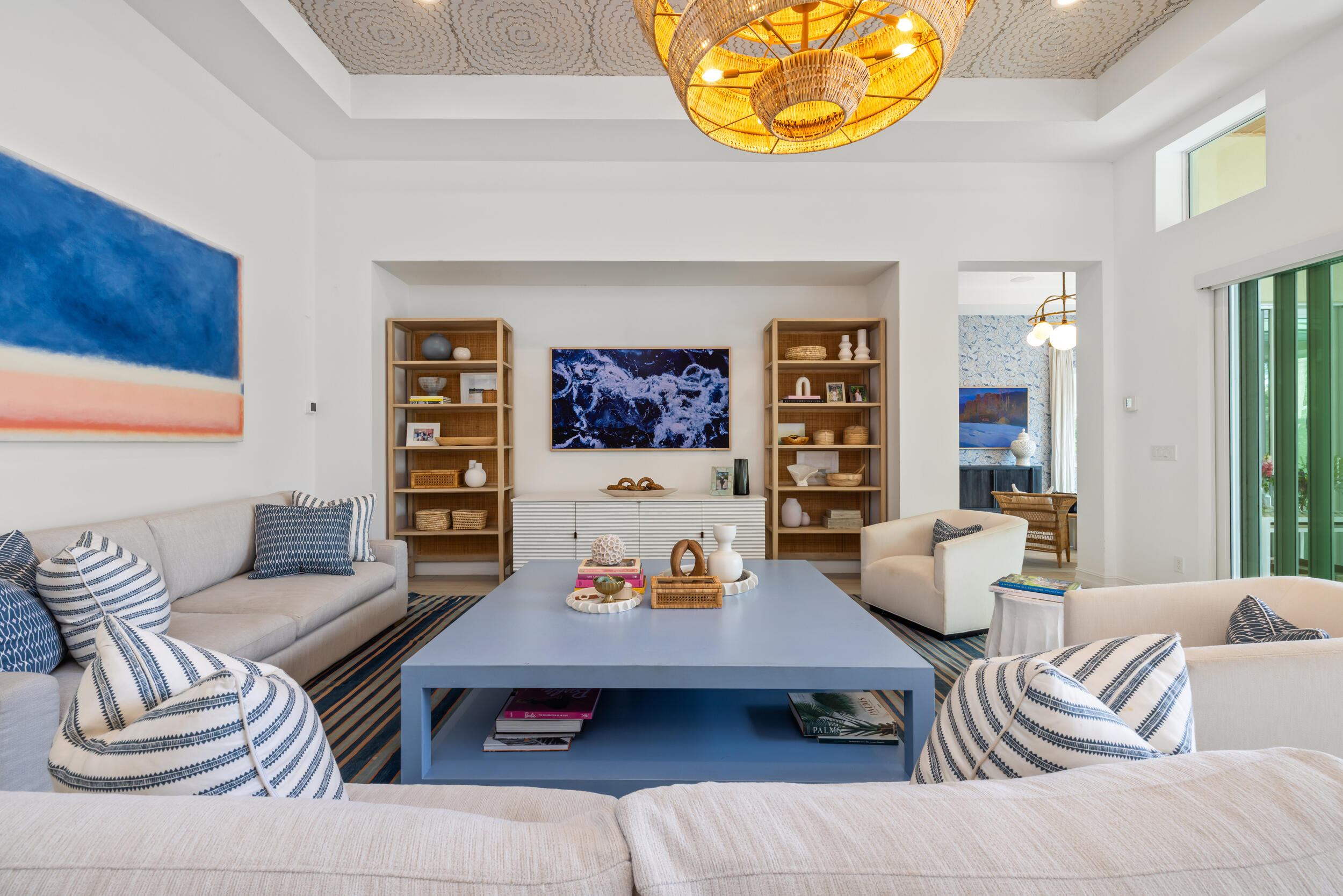 8001 Southeast Plantation Circle Jupiter, FL 33458 - Photo 10 of 50 a living room with furniture and a wall painting