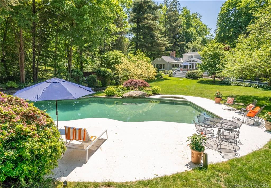 a view of a garden with an outdoor space