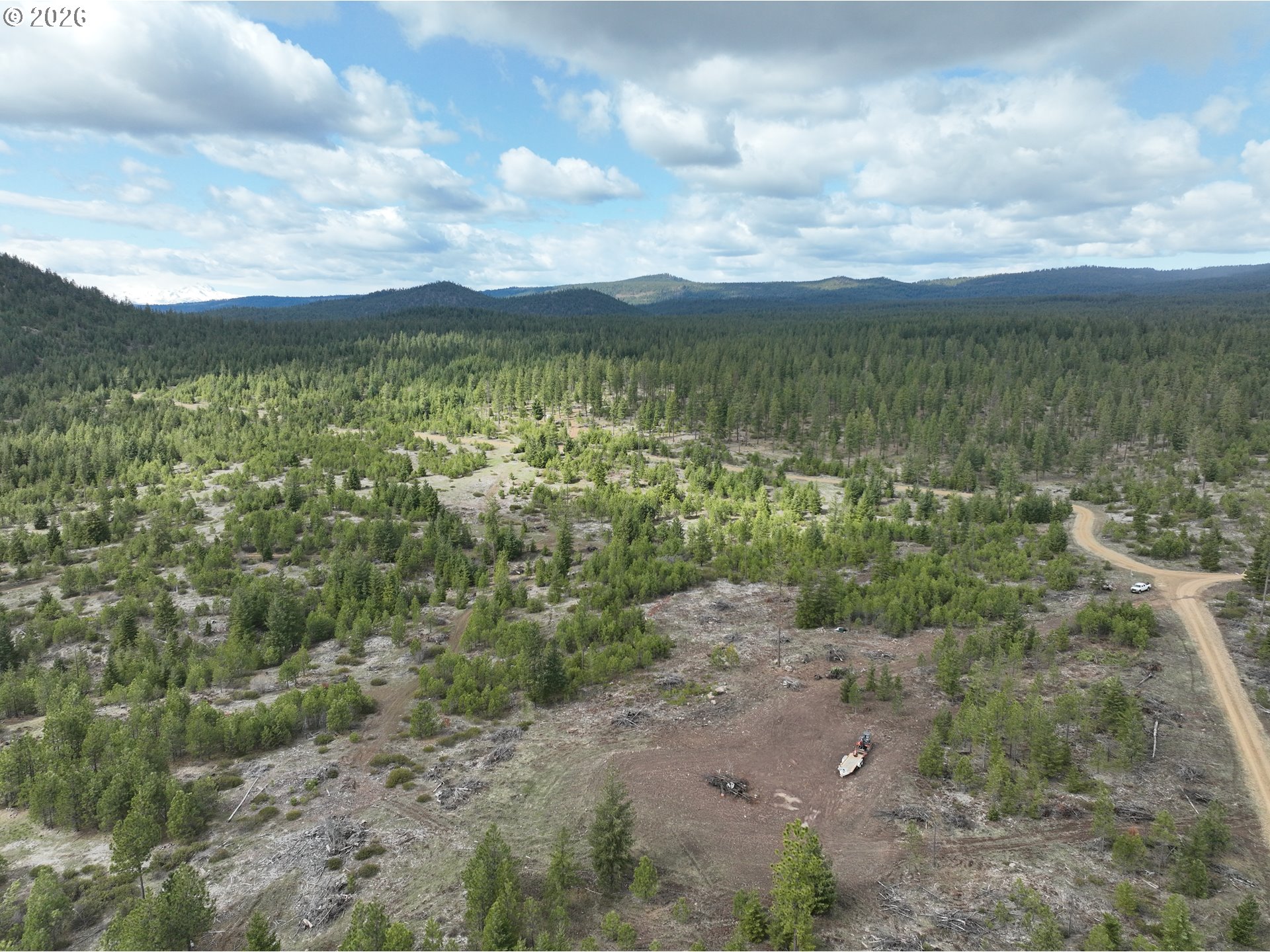 85 Mule Run Road Goldendale, WA 98620 - Photo 26 of 39 a view of a lake with beach and outdoor space