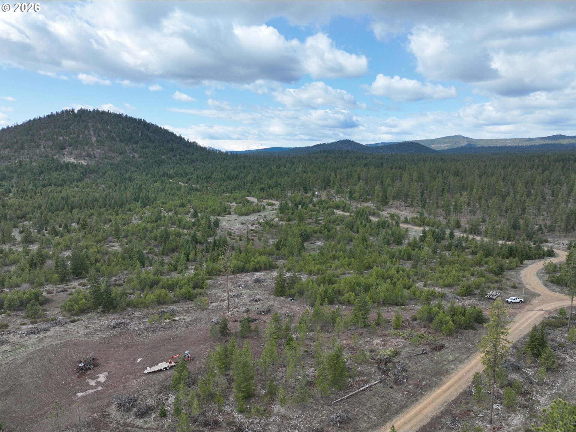 85 Mule Run Road Goldendale, WA 98620 - Photo 34 of 39 a view of a dry yard with mountains in the background