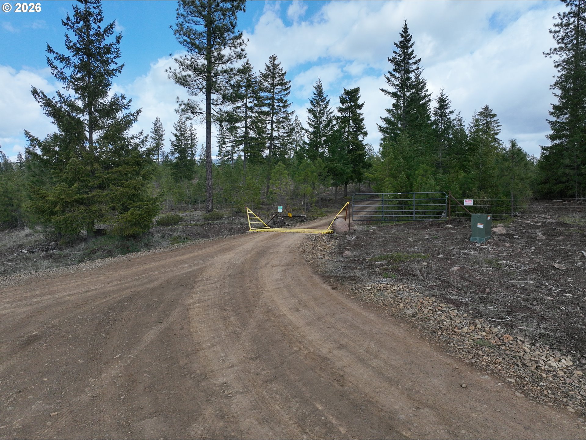 85 Mule Run Road Goldendale, WA 98620 - Photo 38 of 39 a view of a dirt road with trees in the background