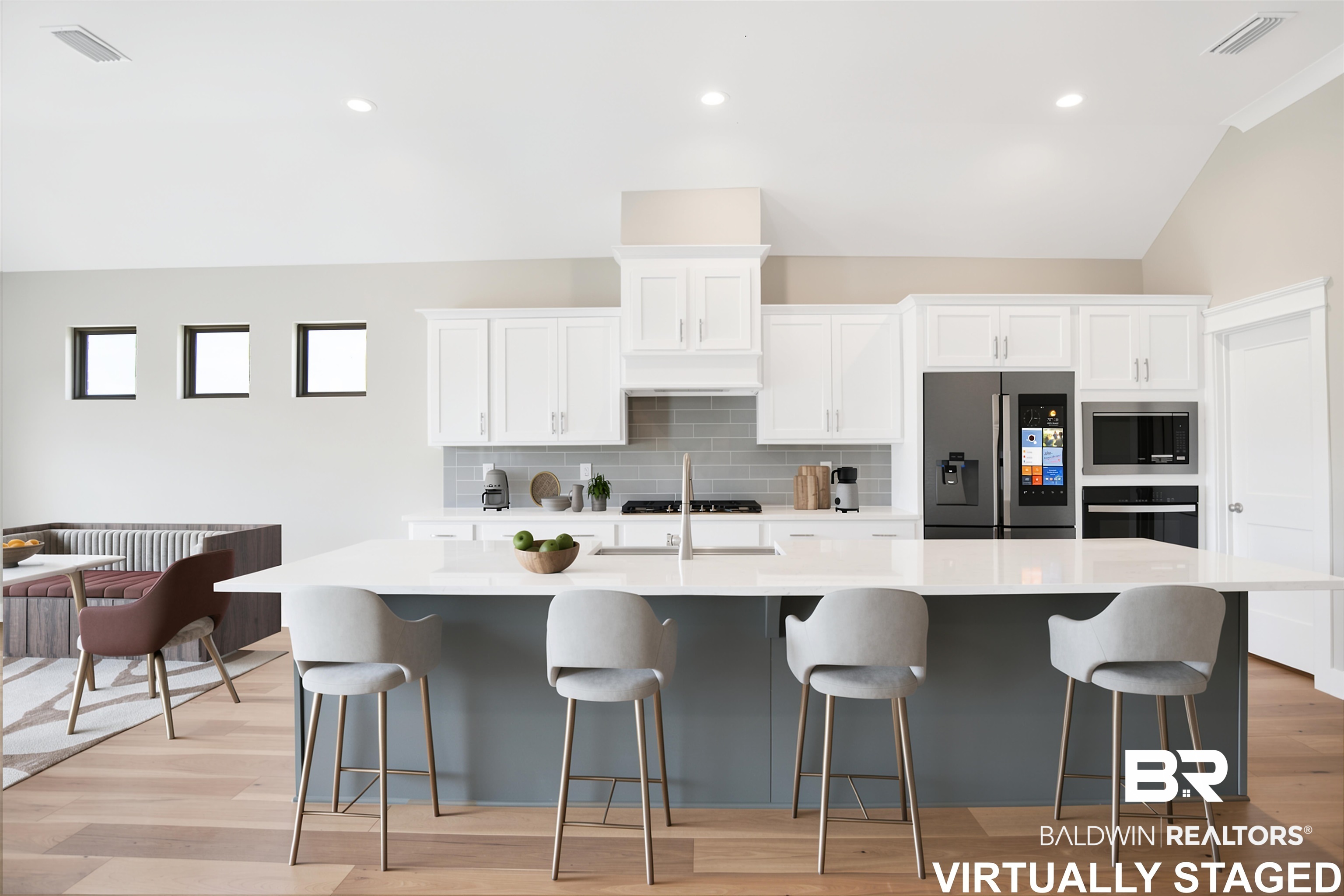 27331 Patch Pl Loop Daphne, AL 36526 - Photo 14 of 62 Open-concept kitchen featuring an expansive island with seating, white shaker cabinetry, gray subway tile backsplash, and stainless steel appliances