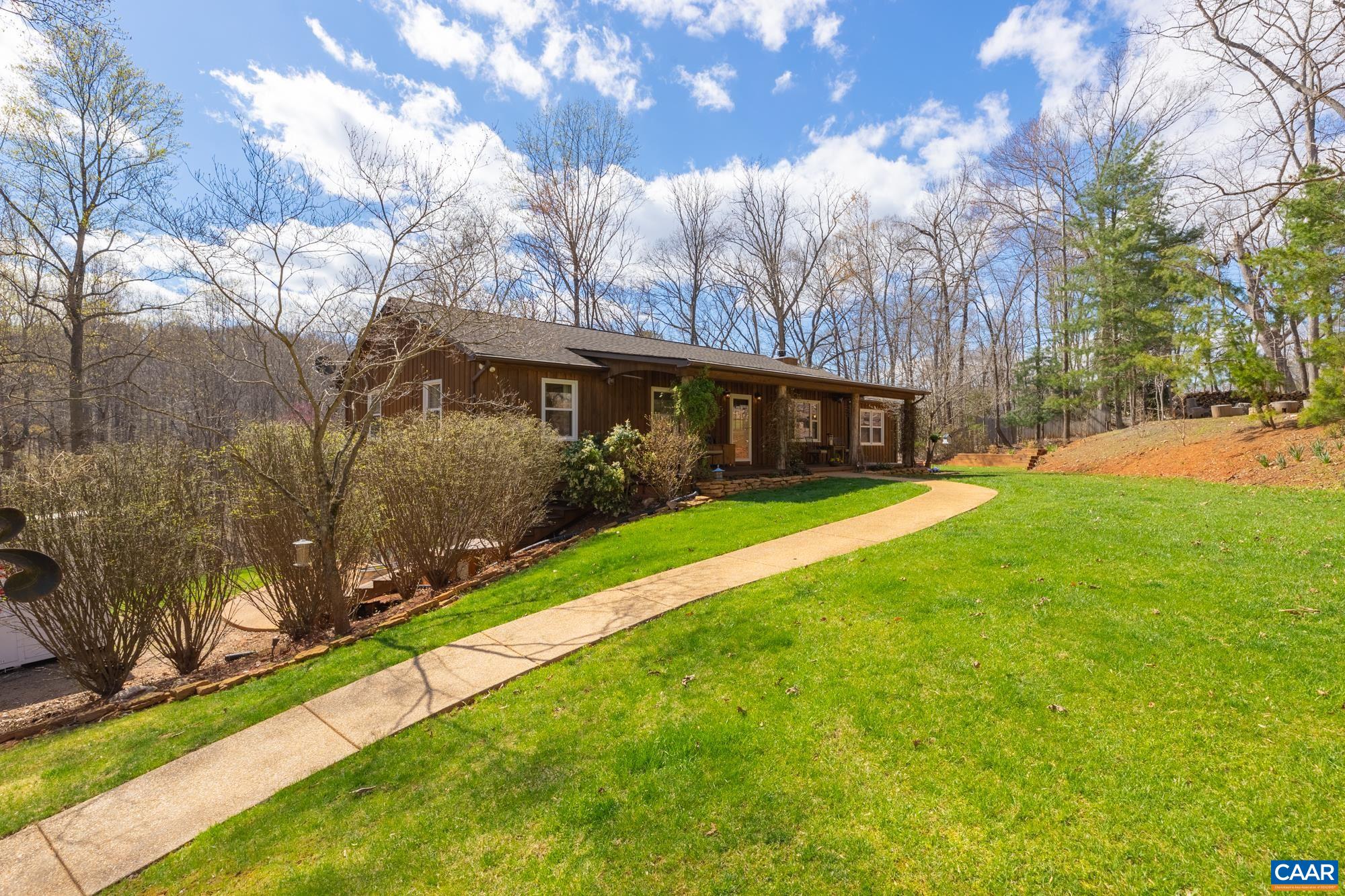 788 Dry Bridge Road Charlottesville, VA 22903 - Photo 3 of 54 a front view of house with yard and green space