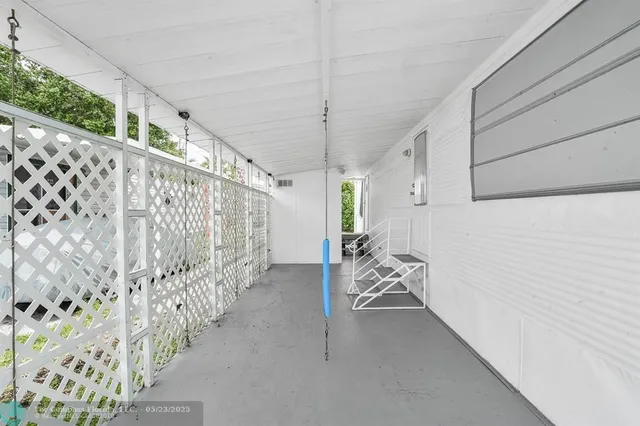 a front view of a house with garage and yard