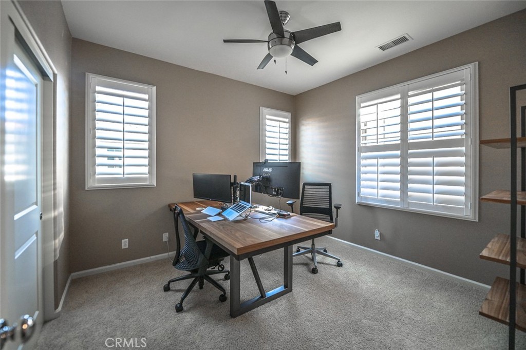 64 Scarlet Bloom Irvine, CA 92618 - Photo 18 of 22 a workspace with furniture and a window