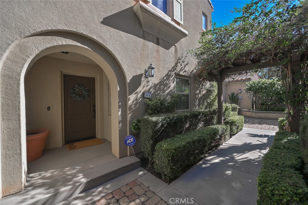 64 Scarlet Bloom Irvine, CA 92618 - Photo 2 of 22 a view of a entrance