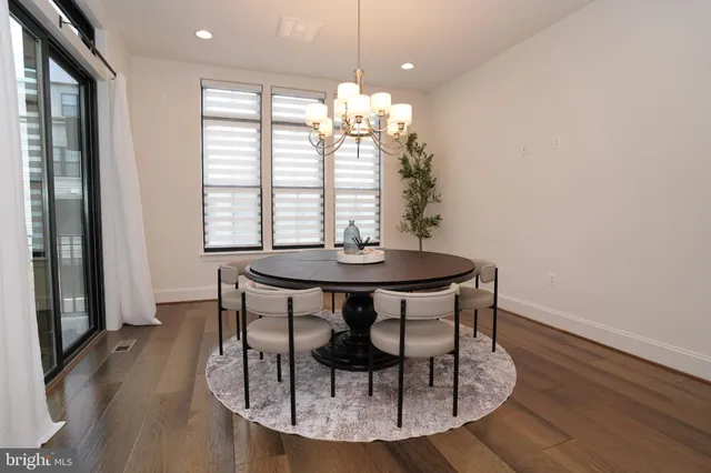 a living room with furniture fireplace and flat screen tv