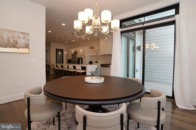 a living room with furniture fireplace and flat screen tv