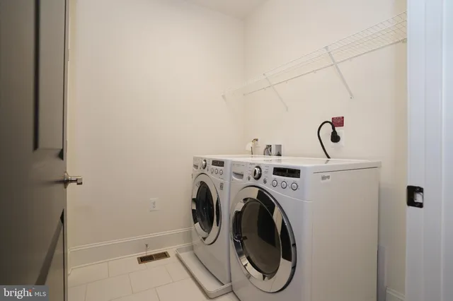 a front view of a building with street view