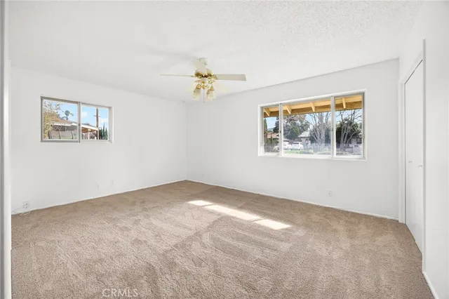 a view of a hallway with a chandelier