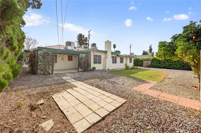 a view of a backyard of a house