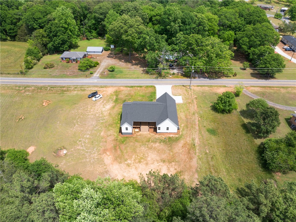 1735 Maw Bridge Road Central, SC 29630 - Photo 35 of 38 This newly constructed residence sits on a generous lot, offering a private setting with mature trees.