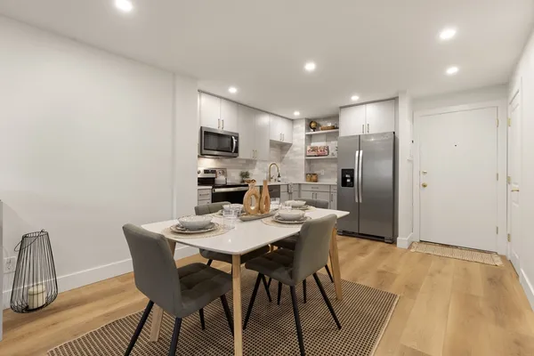 a view of a dining room with furniture