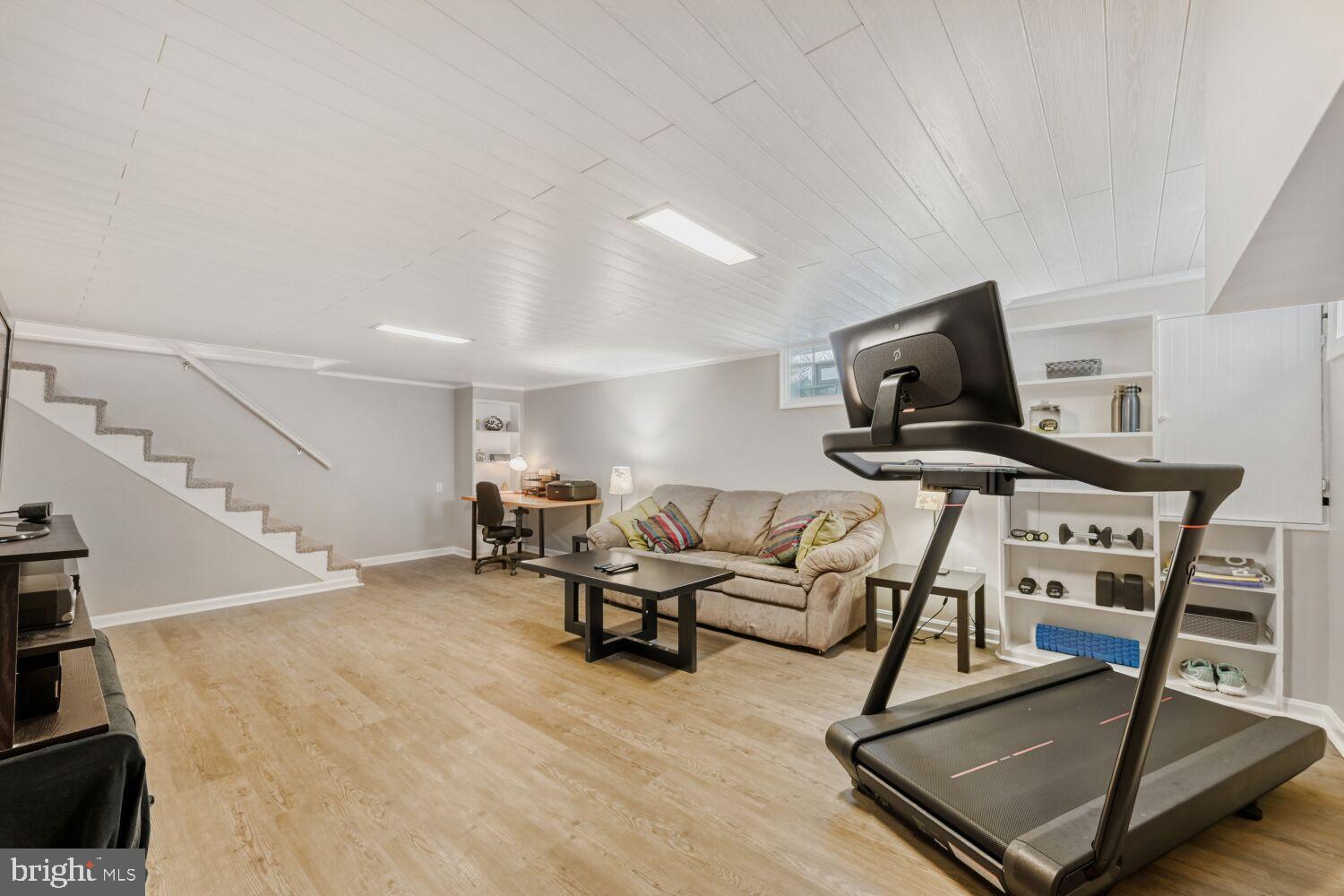 8127 Glen Gary Road Towson, MD 21286 - Photo 23 of 34 Versatile basement retreat for work and play.