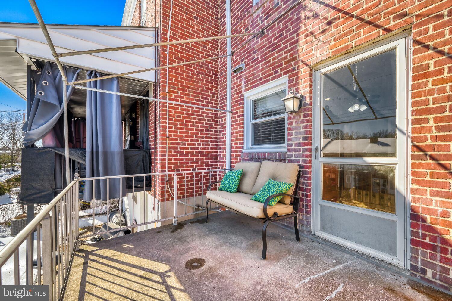 8127 Glen Gary Road Towson, MD 21286 - Photo 27 of 34 Charming patio with cozy seating and sunlight.