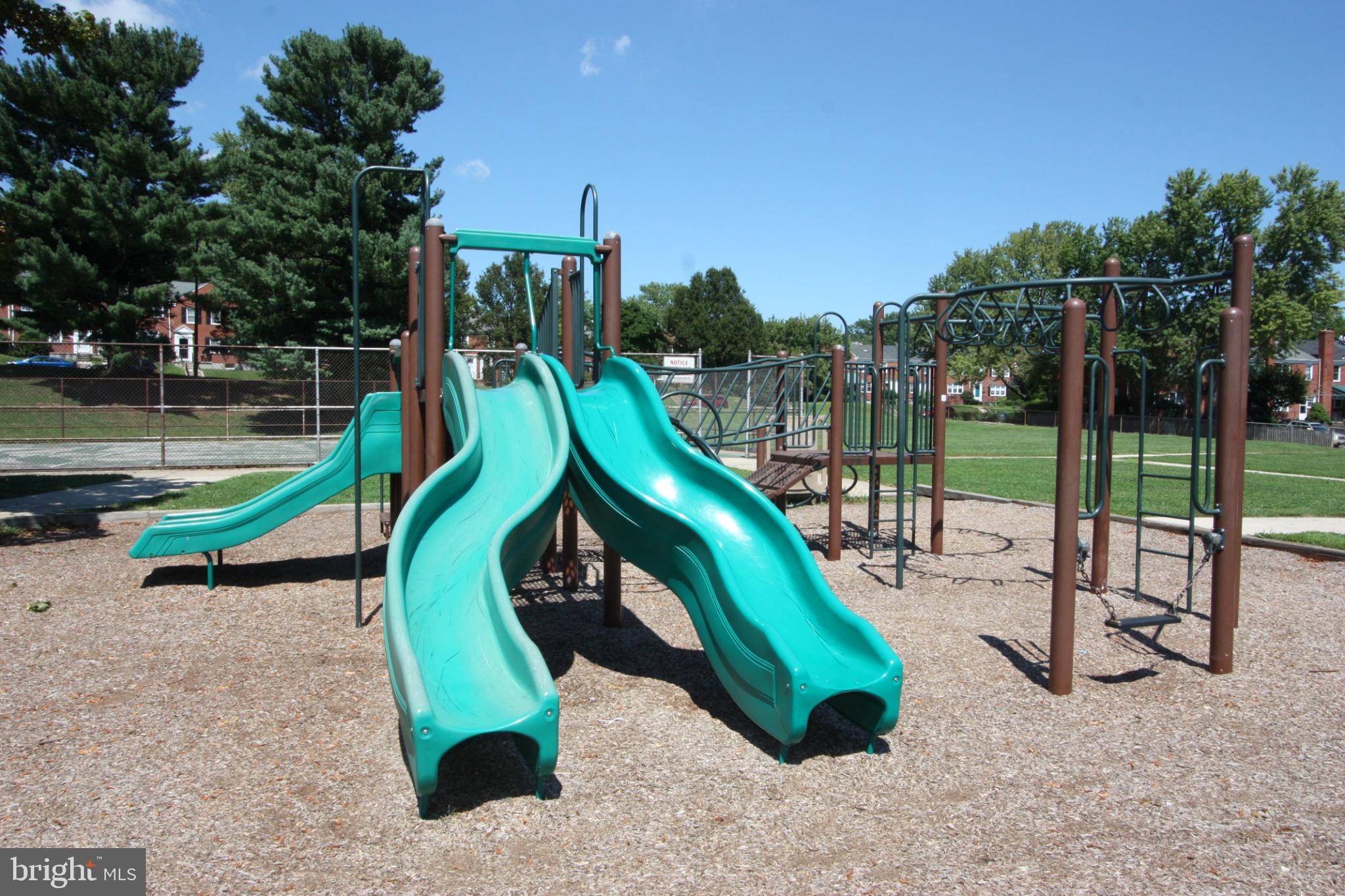 8127 Glen Gary Road Towson, MD 21286 - Photo 34 of 34 Vibrant playground slides invite adventure.