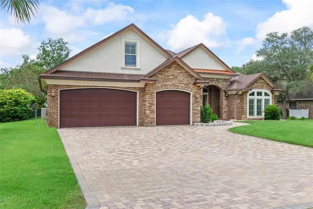 a bathroom with a tub sink shower and mirror