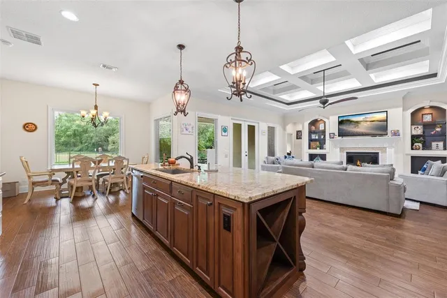 a bedroom with a bed and a ceiling fan