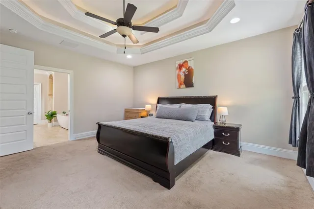 a spacious bathroom with a sink double vanity and a mirror
