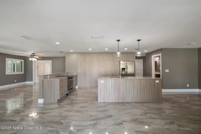 a view of a house with a swimming pool