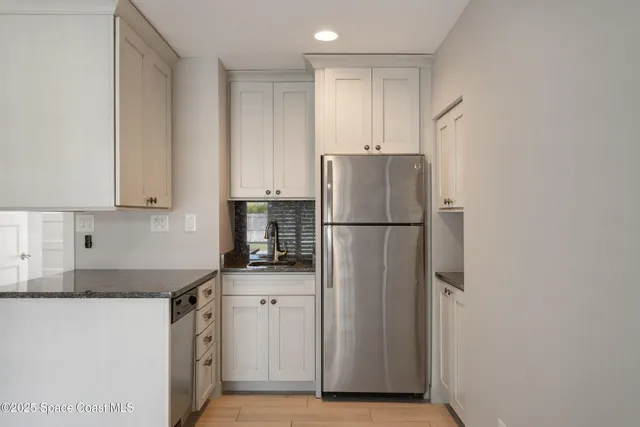 an aerial view of residential house with outdoor space