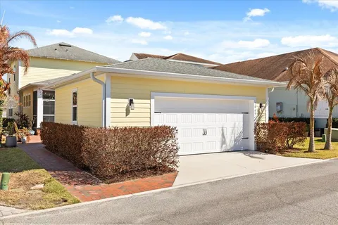 a front view of a house with basket ball court