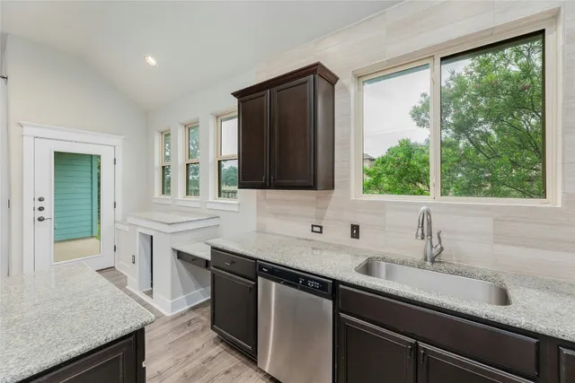a view of a sink and a mirror