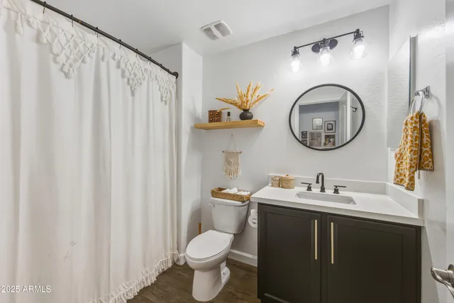 a view of a cars park on the road