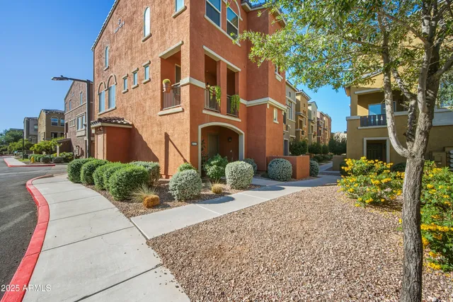 a living room with furniture or couch and a dining table