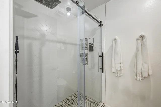 a view of a street with stores