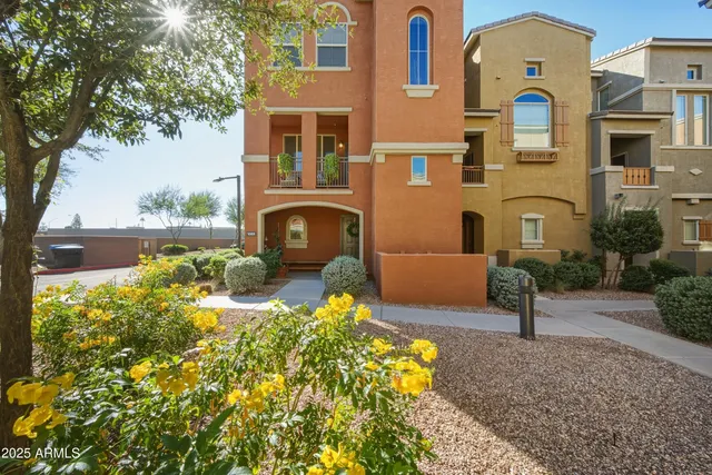 a bedroom with a bed and a book shelf