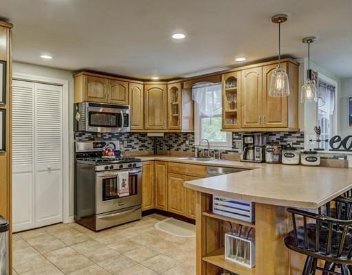 29 Lindsay Road Billerica, MA 01821 - Photo 3 of 28 a kitchen with kitchen island a sink stove and microwave