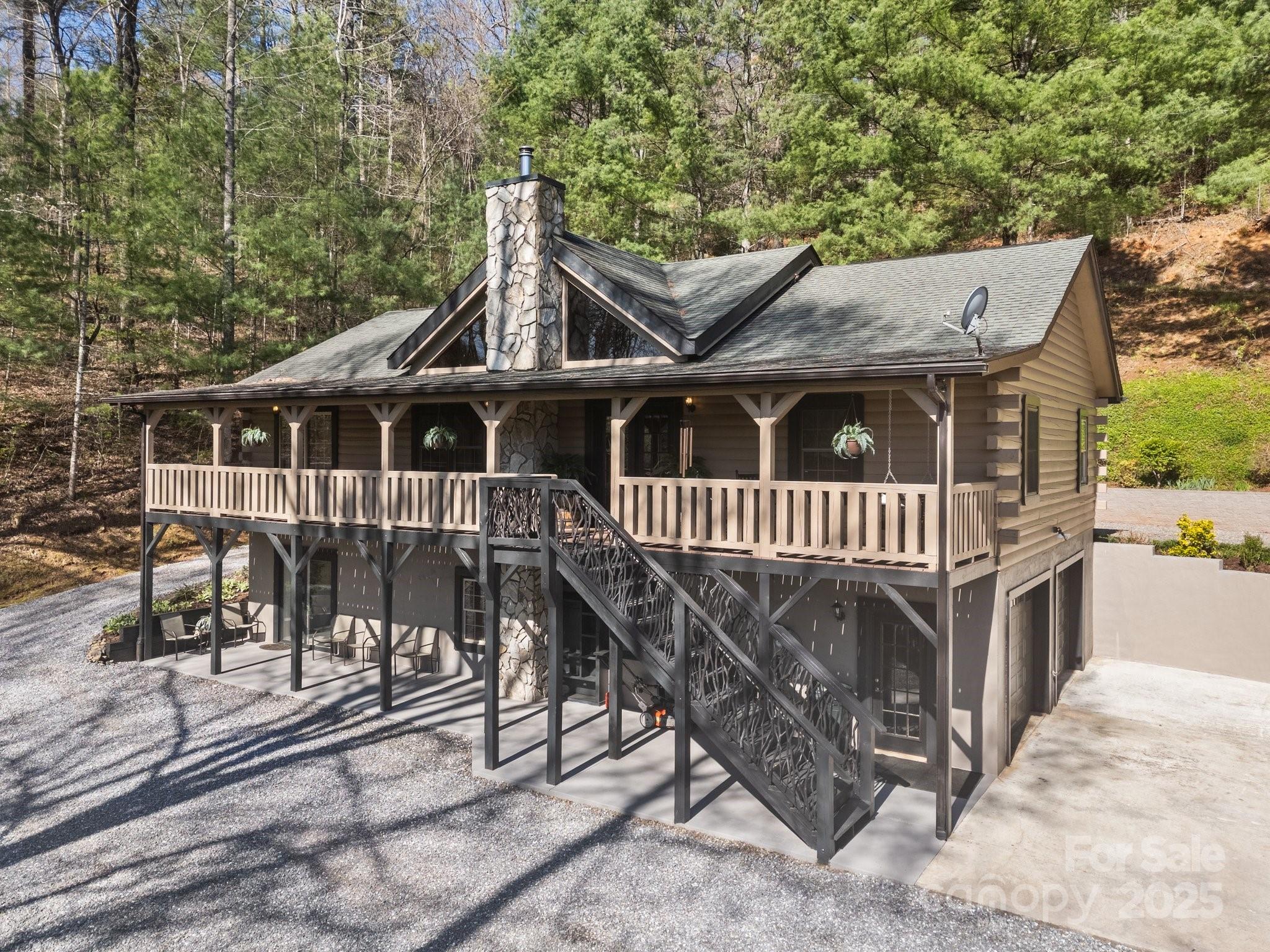 4710 Highway 441 Sylva, NC 28779 - Photo 1 of 40 a view of a house with a wooden deck