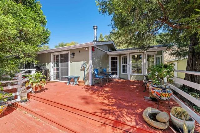 a backyard of a house with seating space