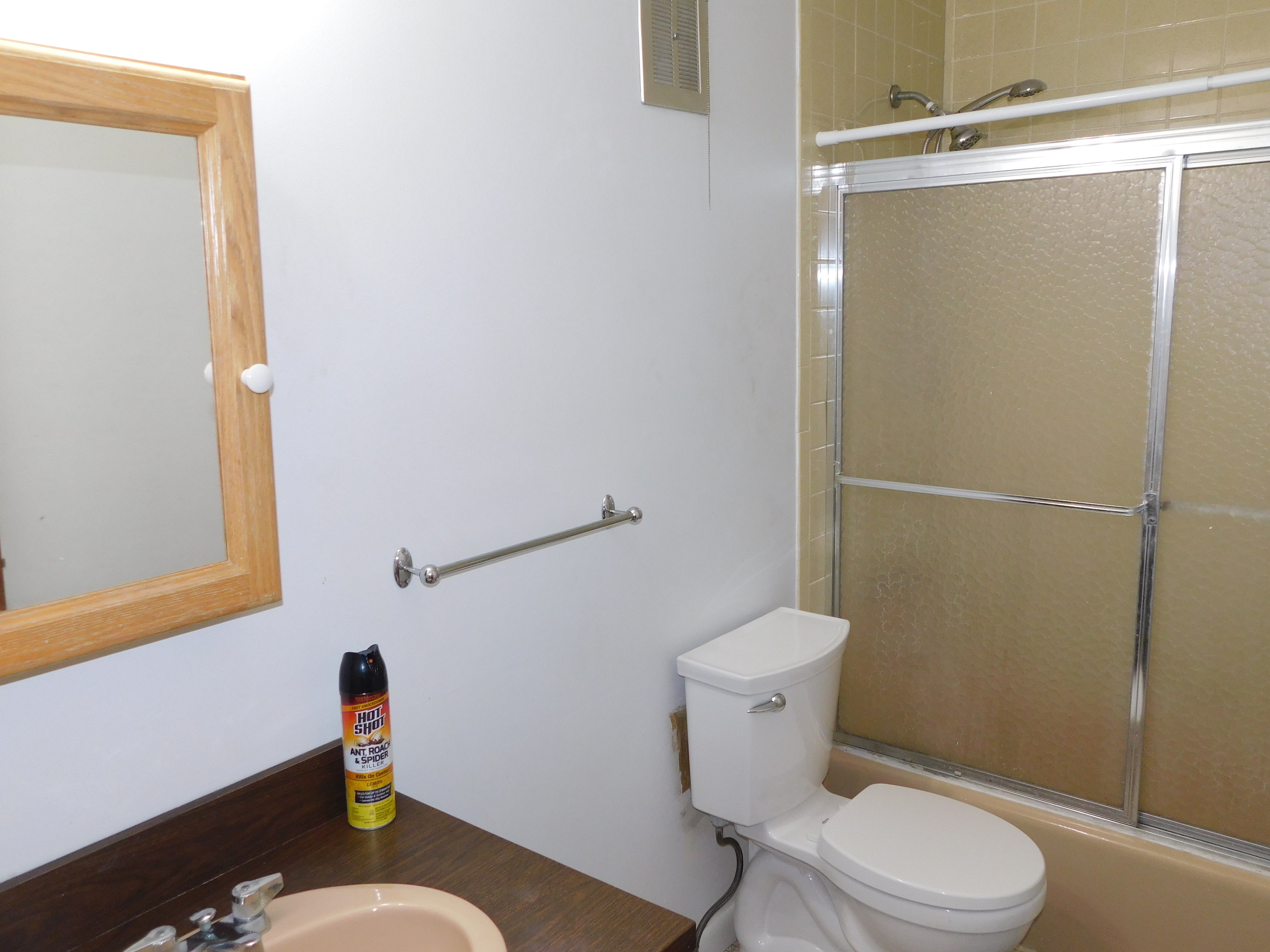 98 High Path Road, Unit 98 Windsor, CT 06095 - Photo 11 of 13 a white toilet sitting next to a bathroom sink