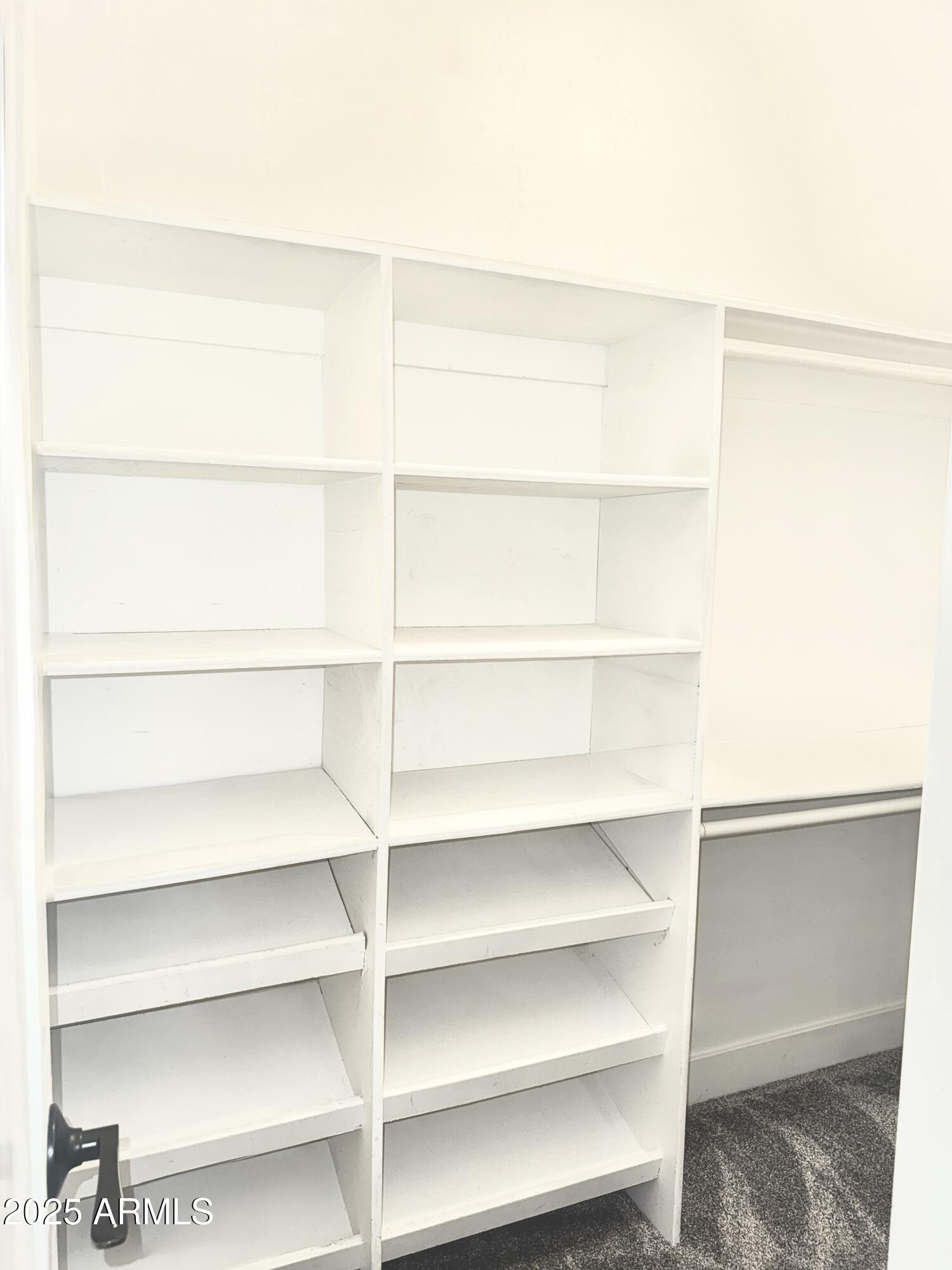 3614 West Granada Road Phoenix, AZ 85009 - Photo 8 of 30 a view of a room with empty racks