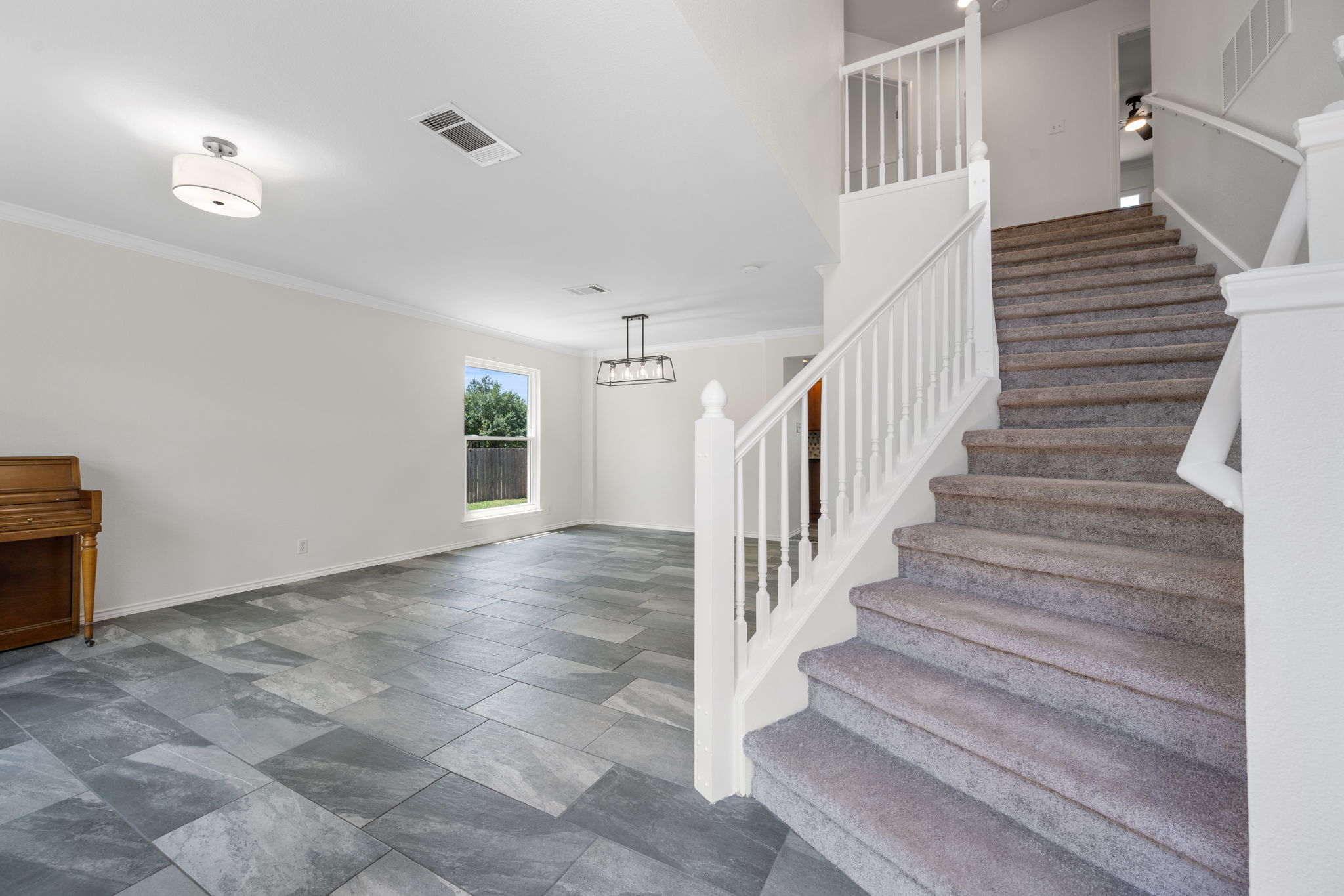2440 Madeline Loop Cedar Park, TX 78613 - Photo 4 of 33 Stairway with baseboards