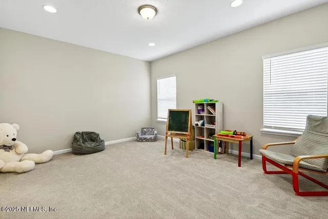 a bathroom with a double vanity sink and mirror