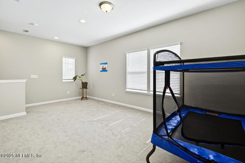542 Silver Landing Drive St. Augustine, FL 32092 - Photo 40 of 55 a view of livingroom with furniture and windows