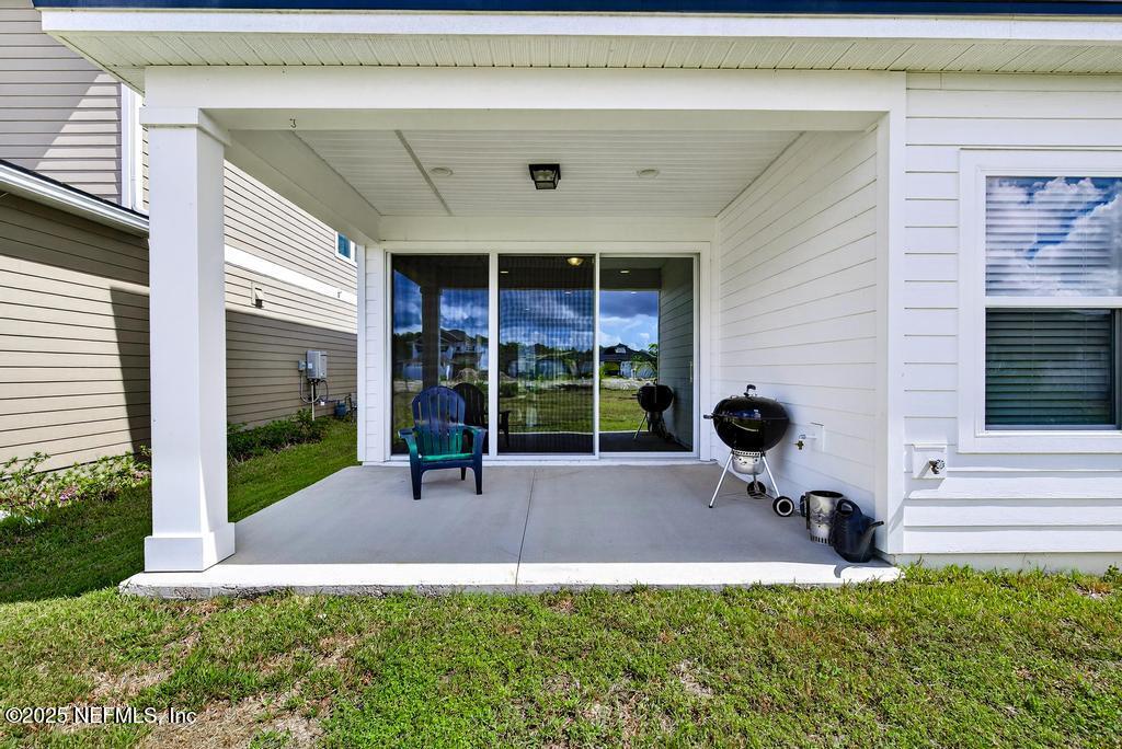 542 Silver Landing Drive St. Augustine, FL 32092 - Photo 50 of 55 a view of outdoor space and porch